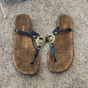 Michael Kors Black and Gold Logo Sandals